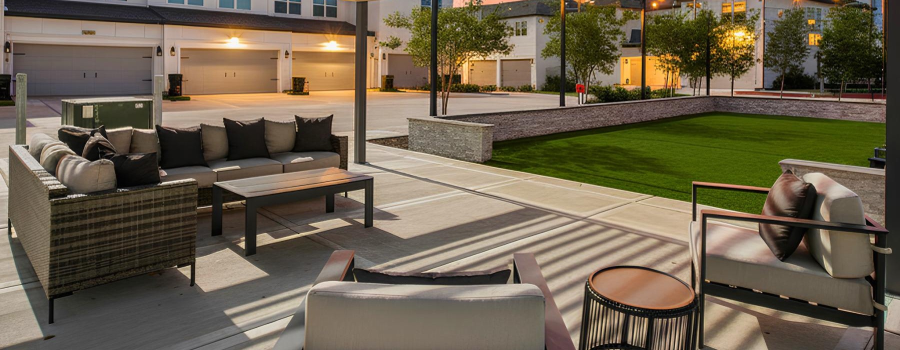a patio with couches and chairs